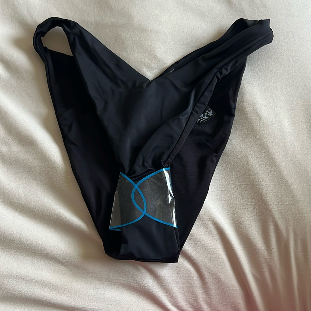Bikini bottom. Size 2. Never worn with sanitary liner attached